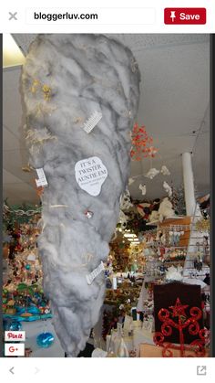 a large rock covered in fake wool and paper machs is on display at a store