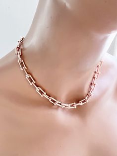 Rose gold plated large U link collar necklace -------------------- DETAILS ・Rose gold plated bold link chain(7mmx 14mm) ・Smaller link: 5mm x 10mm --------------------  Necklace Length * This choker is available in 3 sizes. 14"-16" (14" + adjustable 2 - inch extender) 16"-18" (16" + adjustable 2 - inch extender) 18"-20"(18" + adjustable 2 - inch extender) *It closed with lobster clasp. ------------------- Jewelry care * Plated brass items are expected to tarnish over time, but to help the plating Rose Gold Choker Necklace, Rose Gold Choker, Rose Gold Chain Necklace, Brass Items, Chain Collar, Necklace Rose Gold, Rose Gold Chain, Silver Choker, Necklace Rose