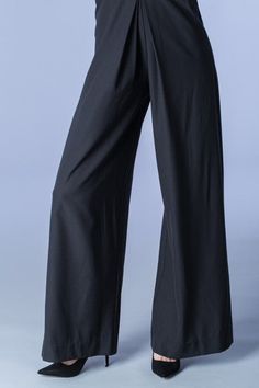 “Contemporary Flirty Halter Dream Jumpsuit” Flared Pant, button halter, zipper back 100%polyester/model sm Elegant Bottoms For Going Out In Solid Color, Solid Stretch High-waisted Jumpsuits And Rompers, Fitted Bottoms In Solid Color For Going Out, Fitted Bottoms For Going Out In Solid Color, Fitted Solid Color Bottoms For Going Out, Formal High Waist Solid Jumpsuit Or Romper, Formal High Waist Solid Jumpsuit, Formal Stretch Solid Color Jumpsuits And Rompers, Stretch Jumpsuits And Rompers For Formal Occasions