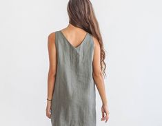 "DESCRIPTION: ♥ 100% natural European linen; ♥ safe Oeko-TEX® Standard 100 certified linen fabric ♥ softened midweight linen (185 g/m2) ♥ sleeveless dress ♥ v neckline FIT ♥ length from the lower to the upper seam is about 33.5 inches / 85 cm ♥ measurements taken from a size S ♥ model is 170 cm and wearing a size S SIZE CHART: XS: Bust 30.7\"- 32.7\" (78-83 cm) , Waist 23.6\"- 25.6\" (60-65 cm), Hips 33.5\"- 35\" (85-89 cm) S: Bust 33\"- 35\" (84-89 cm) , Waist 26\"- 28\" (66-71 cm), Hips 35.5\" Linen V-neck Sleeveless Dress For Vacation, Summer V-neck Shift Linen Dress, Casual V-neck Shift Linen Dress, Summer V-neck Relaxed Fit Linen Dress, Linen V-neck Sleeveless Sundress, Mini Tunic Dress, Linen Wrap Dress, Sleeveless Linen Dress, Summer Linen Dresses