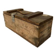 an old wooden box with roped handles on the top and bottom, isolated against a white background