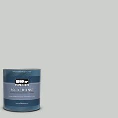 a can of behr ultra paint on a light blue background with the words behr written