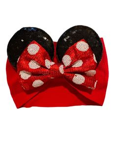 Our Chunky Red Polka Dot Bow Mouse Ear Baby Headband – the ideal companion for your day of whimsical adventures! Designed to add a touch of magic to your ensemble, this delightful accessory features a dazzling 5" traditional red and white polka dot bow attached to 3.25" black sequin mouse ears on a cotton fabric headband. Whether you're headed to a theme park, a costume party, or simply want to infuse a bit of fun into your day, our mouse ear headband is sure to cast a spell on you and everyone Themed Adjustable Hair Accessories For Gifts, Adjustable Red Bow Hair Accessories, Adjustable Red Hair Accessories With Bow, Playful Adjustable Bow Headband, Adjustable Red Fun Headband, Red Adjustable Fun Headband, Red Bow Hair Accessories, Playful Bow Headband For Gift, Adjustable Playful Bow With Matching Headband