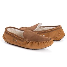 Classic and comfortable, MUK LUKS Men's Everett Moccasin Slippers are great for casual style. Plush foam insoles offer a relaxing feel while wool blended with faux fur lining keeps toes warm all season long. Wipe with Damp Cloth. Do Not Bleach. Dry Flat. Imported -Indoor/Outdoor TPR Sole -80% Polyester, 20% Wool Insole -100% Leather Upper -80% Polyester, 20% Wool Lining -Foam Insole - Men?s Whole Sizes 9-13 -Multiple Color Options Available Winter Brown Moccasins With Rubber Sole, Brown Slip-on Moccasins For Winter, Comfortable Brown Slippers With Rubber Sole, Casual Slippers With Removable Insole And Plain Toe, Comfortable Brown Winter Moccasins, Brown Casual Slippers With Leather Sole, Casual Brown Slippers With Leather Sole, Casual Winter Slippers With Leather Sole, Brown Moccasins With Cushioned Footbed