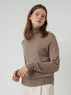 - Classic and basic design- Turtleneck knit- Soft texture Measurements(inch)- Length 23.2- Chest 15.7- Shoulder 15.7- Sleeve length 24 Composition & Care- acrylic 60% , nylon 30% , wool 10% - Dry cleaning Designer- Made in Korea- by LE - Style#:300782046 Winter Beige Fine Knit Turtleneck, Beige Fine Knit Winter Turtleneck, Beige Fine Knit High Neck Sweater, Fine Knit Beige Turtleneck For Fall, Beige High Neck Fine Knit Sweater, Beige Turtleneck Sweater For Work, Beige Turtleneck For Winter Layering, Beige Winter Turtleneck For Layering, Classic Beige Turtleneck For Fall