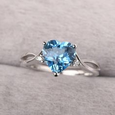 ◆ The ring is handcrafted from sterling silver and decorated with a dazzling 8*8 mm Swiss blue topaz and CZs. It is suitable for engagement/anniversary/daily occasion. ◆ Production Description: Main stone Type: Swiss blue topaz Main Stone Shape: Heart Cut Main Stone Size: 8*8 mm(2.34ct) Side stone: CZ Metal: 925 Sterling silver - Other options available in the drop down menu ◆ Customization: √Free for Add Engraving √Other Metal Type Available √Other Gemstones & Shapes Available √Personalization Pastel Blue Rings, November Birthstone Engagement Ring, Sky Blue Rings, Silver Ring Blue Stone, Engagement Rings Silver Blue, Heart Cut Topaz Gemstone Ring For Promise, Heart Cut Topaz Ring For Promise, Heart Cut Topaz Promise Ring, Heart Cut Topaz Jewelry For Anniversary