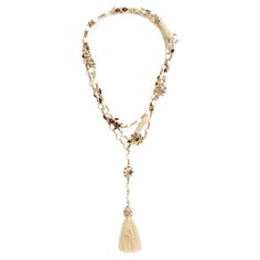 Long necklace or belt from the Chanel Métiers d'Art Paris Bombay collection (Pre fall 2012 - visible on the catwalk) composed of fancy pearls, enameled gold metal motifs in garnet to amber tones, others decorated with colored cabochons, CCs shaped and encrusted with colored pearls and enamel, ecru passementerie beads, ... all finished with a pretty pompom on one side and a carabiner on the other., signed. Total length 160 cm, dimensions of a CC 1.95 x 1.55 cm, diameter of the beads 0.8 cm. The n Colored Pearls, Diamond Drop Pendant, Chanel Pearl, Vintage Chanel Bag, String Necklace, Chanel Box, Chanel Necklace, Chanel Pearls, Pearl Rose