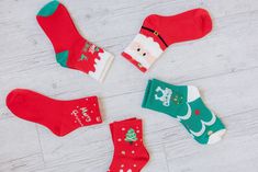 Step up your sock game this holiday season with these 5Pcs Christmas Cartoon Print Socks. These festive and quirky socks will add a touch of playfulness to any outfit. With their fun prints, they are sure to make you stand out from the crowd. Perfect for spreading holiday cheer! Model Info: Models are 5'7", Size 2, wearing smalls Material: 100% Polyester Fun Christmas Gift Socks, Fun Red Socks For Gifts, Cute Red Socks For Gifts, Novelty Christmas Gift Socks, Novelty Winter Socks For Gifts, Novelty Winter Socks For Gift, Novelty Winter Socks As Gift, Novelty Socks For Winter Gift, Red Socks For Winter Gift