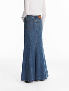 MO&Co. Women's Denim Mermaid Maxi Skirt This denim maxi skirt is made from premium cotton. It's detailed with vertical seams that create a paneled effect and has an exaggerated flared hem. Wear it with a simple top for a chic look. Features : - Flared maxi silhouette- Button and zip closure- Five-pocket design Code: MBD3SKTT06The back length of size S is 98cmMATERIALS & CARE Material: 100% CottonPlease put it into a mesh bag to wash.Denim products have slight fading, which is normal.REMINDER: Al Madewell Fall, Mermaid Maxi Skirt, Denim Maxi, Simple Top, Denim Maxi Skirt, Mesh Bag, Pocket Design, Denim Women, Maxi Skirt