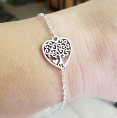 "New Handmade Tree of Life Heart Charm Bracelet ~ Perfect piece for everyday wear, special occasions, or as a great gift for someone special! ~ Silver plated cable chain bracelet ~ Beautiful heart tree of life charm ~ Lobster clasp closure ~ Measures 7\" + has a 2\" extender. ~ Ships within 24 hours of purchase Monday-Saturday" Hypoallergenic Stainless Steel Heart Bracelet For Gift, Hypoallergenic Stainless Steel Heart Bracelet Gift, Nickel-free Charm Bracelet For Friendship On Valentine's Day, Nickel-free Charm Bracelet For Valentine's Day Friendship, Heart-shaped Chain Bracelet With Lobster Clasp As Gift, Adjustable Stainless Steel Heart Bracelet As Gift, Valentine's Day Gift Bracelets With Lobster Clasp, Valentine's Day Gift Bracelet With Lobster Clasp, Valentine's Day Nickel-free Charm Bracelet For Friendship