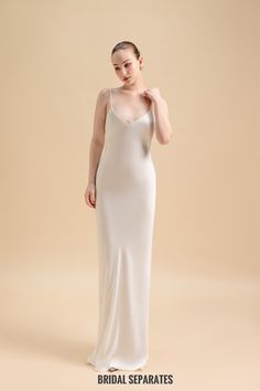 Handmade silk crepe by yours truly. Color :  Light Ivory Details:  Well-constructed double layer crepe silk Spaghetti straps  Deep V back matching the overlay back  Floor length  Zipper closing If you choose custom size, I will message you measurements guide later Shop other BRIDAL DRESSES : https://etsy.me/31l1Ipb Turnaround time: Due to the delicate nature of the handcrafted goods we produce this cover up has creation time of approximately 6-8 weeks  💕Exchange:  For items in standard sizes, I'm happy to accept exchange within 3 days of delivery. Buyers will be responsible for the new shipping fees.  For custom sizes, and custom orders, unfortunately I won't be able to accept exchange since they are made with your specific requirements.  💕Return:  For items in standard sizes, I'm happy Silk V-neck Slip Dress For Wedding, Silk V-neck Slip Dress For Wedding Night, Silk V-neck Slip Dress For Evening, Elegant Modal Satin Wedding Slip Dress, Modal Satin Maxi Length Slip Dress For Wedding, Modal Satin Maxi Slip Dress For Wedding, Elegant Silk Slip Dress For Wedding, Elegant Silk Slip Dress For Wedding Night, Elegant Silk Dress With Spaghetti Straps For Wedding