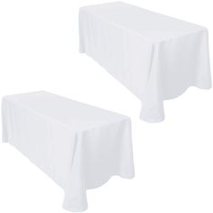 two white tablecloths sitting next to each other