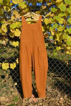 Meet the most comfortable and versatile overalls! Designed with practicality in mind, these overalls will not hinder your movement, no matter what you get up to. Wear them in the garden, out to your favorite coffee shop, or on a hike in the woods. They move and stretch with you, leaving room for long strides and deep squats.  Take advantage of the standard quad pockets for the ultimate hands-free clothing option, add on front pockets, or customize pockets to your needs!  Overalls are made to a s Relaxed Fit Solid Overalls With Side Pockets, Utility Jumpsuits And Rompers With Pockets For Outdoor, Casual Overalls With Pockets For Outdoor, Casual Overalls With Pockets For Outdoor Activities, Utility Overalls With Relaxed Fit And Bib Front, Cotton Overalls With Pockets For Outdoor Activities, Casual Cotton Overalls For Outdoor Activities, Brown Relaxed Fit Jumpsuits And Rompers With Pockets, Cotton Jumpsuits And Rompers With Pockets For Outdoor