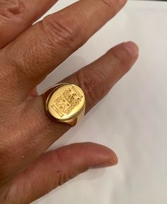 "Engraved Signet ring with Oval Seal - Best quality 18k Gold Plate over sterling silver - High Quality Special engraving technique using which create the appearance of crest or other images of your choice. Great for Men or Women. Looks great on any finger, and especially cool as a pinky ring. Please attach in \"convo box\" the picture / family crest you want me to engrave - as high quality the pic is as good the result we get If you have any questions please feel free to contact The product will Men Pinky Ring, Pinky Ring Gold, Family Crest Ring, Picture Family, Family Crest Rings, Personalized Ring, Gold Signet Ring, Etsy Gold Ring, Personalized Rings