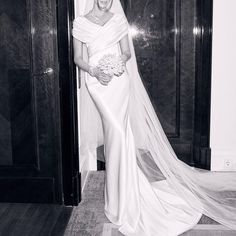 black and white photograph of a woman in a wedding dress