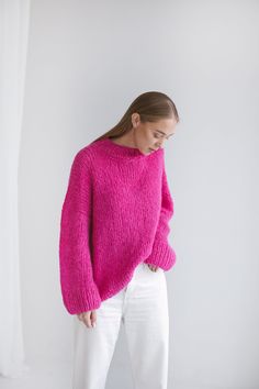 "Crafted from a soft blend of alpaca wool and silk in a vivid shade of pink, this sweater is designed for an oversized fit and has chunky ribbed trims, laid-back drooped shoulders. Wear it with classic trousers, jeans or wide skirts. Composition: alpaca wool, silk. Cerise color. Available sizes Petit size/XS/S/M/L/XL The model wearing size M and she is 172 cm/5'8\" tall. We offer the possibility to make a garment by your own measurements if you send us a message. CARE INSTRUCTIONS For best resul Pink Knitwear Outfit, Rose Pink Sweater Outfit, Hot Pink Sweater Outfit, Pink Jumper Outfit, Cerise Color, Pink Sweater Outfit, Vietnam Trip, Magenta Sweater, Pink Oversized Sweater