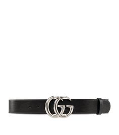 The Gucci Marmont belt is an iconic leather accessory that elevates any outfit with effortless sophistication. Inspired by 1970s designs, this belt features the signature Double G buckle that adds a touch of luxury to everyday looks. Crafted from premium leather, it will develop a unique patina over time making it a treasured part of your wardrobe for seasons to come. Instantly recognizable designer details and quality construction ensure this belt packs designer weight that turns heads without Gucci Black Luxury Belt, Classic Black Gucci Belt, Luxury Black Gucci Belt, Elegant Black Gucci Belt, Modern Gucci Belt For Formal Wear, Modern Gucci Belts For Formal Occasions, Gucci Formal Belt With Metal Logo, Chic Gucci Belt For Formal Occasions, Classic Gucci Belt Buckles