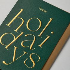 a green book with gold lettering that says happy hola ka'oi avs