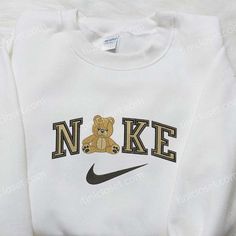 Introducing the TeddyBear x Nike Embroidered Sweatshirt, the perfect blend of comfort and style. Crafted with precision, this sweatshirt features Nike Embroidered Sweatshirt, Teddy Bear Embroidery, Nike Inspired, Nike Crewneck Sweatshirt, Nike Crewneck, Bear Embroidery, Custom Sweaters, Diy Sweatshirt, Nike Sweatshirt