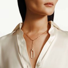 An elongated 14k gold pavé linked pendant hangs heavy at the end of our signature paperclip chain. Clasp it anywhere along the chain for endless lariat looks to elevate your everyday! SKU #CN518PV 14mm x 45mm linked pendant lariat necklace 234pc 0.7-1.4mm G-H VS1-SI1 pavé set diamonds 59pcs G/H SI pave set round diamonds 0.64ctw 3.3mm paperclip chain 14k yellow or white gold Lariat Necklace, G H, Long A Line, Pave Diamonds, Round Diamonds, The End, Diamonds, White Gold, Yellow Gold