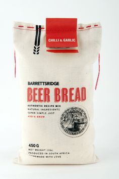 a bag of beer bread sitting on top of a white table