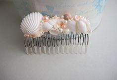 "Seashell hair comb, Beach wedding, Beach hair accessory Seashell Hair accessories Mermaid hairpin,  Nautical, shell bridal hair comb, beach bridal comb, Bridal Pearl Headpiece   These beautiful seashell hair comb will make a great statement on your special day and beach wedding. A magnificent beach accessory for bride and bridesmaid. The seashell hair comb  3.4\" - (8.5 cm.) I am open to custom orders. Here you can see our offer for sea bridal belt: https://www.etsy.com/listing/698251465/beach- Shell Headpiece, Seashells Hair Accessories, Mermaid Headpiece, Seashell Hair, Beach Hair Accessories, Bridesmaid Hair Clips, Pearl Headpiece, Headpiece Hairstyles, Beach Bridal