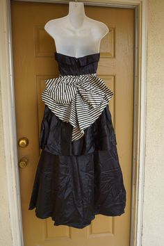 "Gunne sax 1980s party dress. Labeled size 7 -please see measurements, Boned bodice. Zips in the back. Condition - has some color fade at armpits - see last two photos. Measurements taken across front lying flat 16\" across front armpit to armpit 13\" across front of waist 43\" length armpit to bottom" Strapless Ball Gown With Ruffles For Party, Vintage Corset Dress For Spring Party, Evening Strapless Ball Gown With Ruffles, Vintage Strapless Corset Dress For Party, Vintage Party Dress With Bow, Vintage Fitted Strapless Evening Dress, Vintage Fitted Strapless Dress For Party, Striped Strapless Party Dress, Striped Lined Party Dress