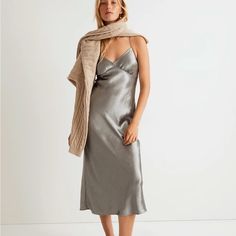 Crafted Of Luxe Recycled Metallic Satin Woven With Eco-Friendly Lenzing Ecovero Fibers, This Fan-Favorite Midi Slip Dress Drapes Beautifully On The Body. With Thin Cami Straps, A Sexy V-Neckline And Angular Seaming At The Bust, It's The Perfect One-And-Done Party Piece, Or Wear It Layered For An Easy Pared-Down Moment. Body-Skimming Fit. Falls 52" From High Point Of Shoulder (Based On Size 6). 100% Polyester (50% Of Which Is Recycled). Do Well: Made From Polyester Recycled From Materials That Could Otherwise Go To Landfills. Dry Clean. Imported. Item No120 Dress Drape, Midi Slip Dress, Wrap Midi Dress, Tiered Midi Dress, Madewell Dresses, Dress Satin, Satin Slip Dress, High Point, Tee Dress