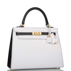 Luxury White Bags With Turn-lock Closure, Luxury White Bag With Turn-lock Closure, Luxury Everyday Calf Leather Bag With Lock, Timeless White Bag With Turn-lock Closure, Luxury Calf Leather Bag With Lock, Timeless Calf Leather Bag With Hasp Closure, Business Bags With Lock In Calf Leather, Chic Epsom Leather Bag With Lock, White Leather Bag With Hasp Closure