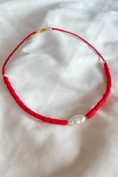 Basic Description: Handmade assorted red fimo beaded necklace. Very dainty. Necklaces are joined with a lobster-style clasp and two inch extended chain.  Sizing:  Each necklace is made with a two inch extender chain so the size can be adjusted to your liking. For example, the 16 inch necklace can be extended up to 18 inches. Care: While necklaces will not be damaged by moisture, avoid getting your necklace wet to prevent potential fading or tarnishing. Dainty Red Necklace With Lobster Clasp, Red Beaded Dainty Jewelry, Dainty Red Beaded Necklaces With Round Beads, Dainty Red Beaded Necklace With Round Beads, Red Adjustable Dainty Necklace, Red Dainty Adjustable Necklace, Adjustable Red Dainty Necklace, Dainty Adjustable Red Necklace, Adjustable Red Beaded Necklace With Lobster Clasp