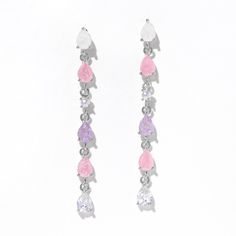 Our Lavender Haze Dangle Earrings is like wearing a pastel and cotton candy dream. They feature dazzling shades of pink, lavender, and milky CZ stones that are as sweet as it gets. Day or night, these will be your go-to earrings whenever you’re looking to add pops of pastel to any look. Lavender Drop Earrings For Party, Trendy Pink Dangle Teardrop Earrings, Trendy Pink Teardrop Earrings, Pink Drop Earrings For Party, Pastel Drop Earrings Jewelry As Gift, Elegant Pink Crystal Drop Earrings, Pink Drop Crystal Earrings For Party, Lavender Crystal Drop Earrings, Pink Teardrop Crystal Earrings For Pierced Ears