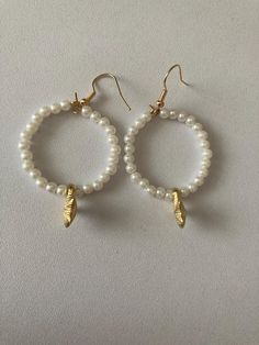 A pair of beaded faux pearl hoop earrings with small gold coloured star fish. Star Fish, Pearl Hoop Earrings, Colour Star, Beaded Earrings, Faux Pearl, Halloween Shopping, Jewelry Earrings Dangle, Gold Color, Etsy Earrings