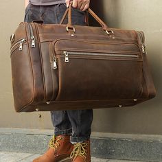 🧳 Crazy Horse Leather Men's Travel Bag - Big Duffel 🧳 🌟 Premium Material:  Made from 100% genuine cowhide full grain leather, this duffel bag offers exceptional strength and a luxurious appearance. The leather ages beautifully, adding character over time. 🐄✨ 🛠️ Handmade Craftsmanship: Each bag is handmade with meticulous care and skill. This isn't just a bag; it's a high-quality piece of art, reflecting superior craftsmanship in every detail. 🖐️🎨 ✍️ Custom Personalization: Add a personal Luxury Leather Duffle Bag With Leather Lining, Luxury Leather Rugged Duffle Bag, Luxury Rugged Leather Duffle Bag, Luxury Brown Duffle Bag For Travel, Mens Overnight Bag, Mens Weekend Bag, Leather Duffel Bag, Leather Weekender Bag, Leather Duffel