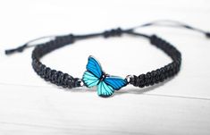 Dark Blue and Teal Butterfly Bracelet that is a great gift for Men or Women. The wings are dark blue and teal.  At the center of the bracelet is a butterfly charm measuring 15x20mm.  This bracelet is adjustable to ensure a great fit. Many colors to choose from. (Pictures shown are black, turquoise and teal)Colors of cord that will match the wings:--TealColors of butterfly may vary slightly depending on monitor settings.  I also notice that inside lighting vs natural lighting outside may make the Turquoise And Teal, Fairytale Gifts, Bracelet Butterfly, Teal Butterfly, Dragonfly Bracelet, Butterfly Fashion, Fish Jewelry, Whimsical Jewelry, Dragonfly Jewelry