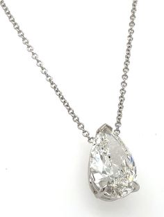 Adorn yourself with refinement and rarity wearing this GIA Certified 3.68Carat Diamond Pear-shape Solitaire Pendant Necklace. Expertly cut and polished to emit an illuminating sparkle, this luxurious necklace is a symbol of prestige. Let its exquisite beauty catalyze your ensemble with timeless sophistication. Metal: 14K White GoldDiamond Shape: Pear-cut Approx. Dimensions: 9mm X 15mmDiamond Weight: 3.68carat Natural earth-minedCertificate: GIA certificate # 5221618021Chain Length: 17''- 18' Formal Pear-shaped Diamond Necklace, Fine Jewelry Platinum Pear-shaped Diamond Necklace, Platinum Pear-shaped Diamond Necklace, Platinum Pear-shaped Necklace In Diamond White, Platinum Pear-shaped Diamond White Necklace, Diamond White Platinum Necklace In Pear Shape, Pear-shaped Platinum Necklace In Diamond White, Platinum Pear-shaped Necklace With Brilliant Cut, Luxury Pear-shaped Vvs Clarity Diamond Necklace