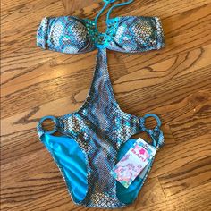 Beautiful Monokini With Rhinestone Detail On Top And Aqua Hardware On Bottom. Self Tie Halter Top. Party Swimwear With Rhinestones For Beach Season, Summer Rhinestone Swimwear For Poolside, Rhinestone Swimwear For Poolside In Summer, Rhinestone Swimwear For Poolside And Beach Season, Beachwear Swimwear With Rhinestones For The Beach, Rhinestone Swimwear For Summer Poolside, Fitted Swimwear With Rhinestones For Summer, Party Beachwear With Rhinestones, Beachwear Swimwear With Rhinestones For The Pool