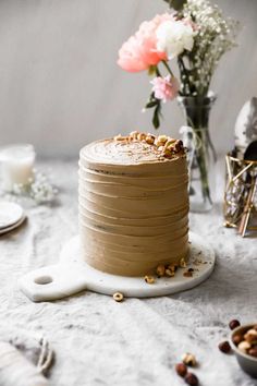 a cake sitting on top of a white table