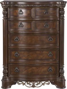 an ornate wooden dresser with drawers