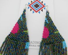 Amazing Modern Powwow Native American Style Boho Seed Bead Earrings with a variety of native colors in a modern non-traditional design. Stainless steel ear wires and genuine high quality beads. A beautiful combination of colors and native design at a super price. At nearly 6 inches in total length these are just amazing. Great to wear alone or to match with your dancing regalia. Cool modern look with a traditional flair. All handmade. Shipped Free to your home or office from Hawaii. Aloha! Multicolor Southwestern Style Dangling Beads, Southwestern Multicolor Dangling Beads, Southwestern Style Multicolor Dangling Beads, Southwestern Green Earrings With Colorful Beads, Southwestern Style Green Earrings With Colorful Beads, Southwestern Green Beaded Dangling Earrings, Southwestern Green Beaded Dangle Earrings, Southwestern Green Earrings With Dangling Beads, Southwestern Multicolor Beaded Earrings For Beach