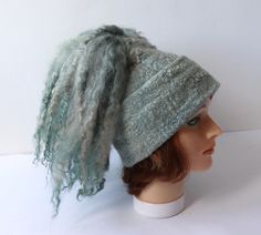 Felted hat, Grey wool hat, Felt winter warm hat, Curly free Wool Hat Unisex, Warm felt hat This felted hat was made of soft merino wool and fancy yarn wool through a wet felting process.  Felt hat is decorated with silk fibers, wool locks  You can make folds and wearing a hat on the different ways. Felted hat is warm and perfect for cold weather.   Head circumference 57-58 cm  Easy care. Hand wash in soap water. Rinse, let it dry. Steam iron. Thanks, for visiting my shop Ready to ship Felted Hat, Hat Felt, Wearing A Hat, Steam Iron, Wet Felting, Felt Hat, Wool Hat, Natural Wool, Warm Winter