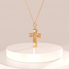 14k Solid Gold Cross Pendant 14k Solid Gold Minimalist & Tiny Design Religious Cross Charm Pendant Necklace for Women with Color Options. Wear it alone or stack with other necklaces to have timeless and completed everyday look.   Pendant Details  ❥ Gold KT: 14k Solid Gold   ❥ Gold Color Options: Yellow Gold, White Gold, Rose Gold  ❥ Pendant: 15.60x10.30 mm  ❥ Thickness: 1.32 mm  ❥ AAA Grade White Cubic Zirconia  ❥ It can be used with up to 3 mm chains. If you are to use it with a thicker chain, 14k Gold Cross Necklaces For Baptism, 14k Gold Cross Pendant Necklace For First Communion, 14k Gold Cross Necklace For Baptism, Yellow Gold Cross Pendant Necklace With Birthstone, Yellow Gold Birthstone Cross Pendant Necklace, 14k Yellow Gold Necklace For First Communion, Elegant Yellow Gold Necklace For Baptism, 14k Gold Crucifix Necklace For Baptism, Minimalist Gold Jewelry For Baptism