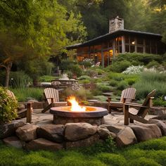 an outdoor fire pit with chairs around it