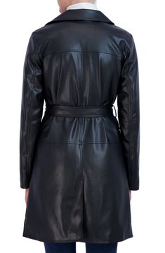 Faux leather creates an essential trench coat that is a must-have for colder days. 36.5" length Noched collar Long sleeves Double breasted closure Waist ties Dual front pockets Self: 100% PU, Lining: 100% polyester Machine wash Imported Model stats: 5'10" height, 32" bust, 25" waist, 36" hip. Model is wearing size S Winter Office Leather Jacket With Belt, Fitted Faux Leather Belted Outerwear, Sleek Leather Belted Outerwear, Winter Belted Faux Leather Outerwear, Winter Faux Leather Belted Outerwear, Belted Faux Leather Long Coat, Belted Long Faux Leather Coat, Sleek Faux Leather Outerwear With Button Closure, Sleek Belted Fall Outerwear