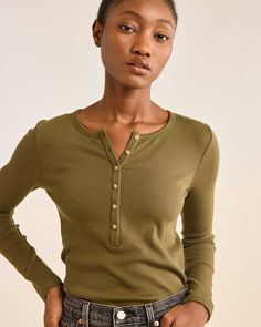 A fitted pullover top knit from soft Peruvian Pima cotton in a 1x1 "baby" rib, perfect for layering under a shirt, sweater or jacket. A touch of spandex adds shape retention. Scoop neck accented with six small buttons. Double-stitched hem. 96% Pima cotton/4% spandex. Imported. | WOMEN'S LONG-SLEEVE PIMA COTTON HENLEY Versatile Crew Neck Tops With Ribbed Cuffs, Casual Stretch Long Sleeve Top For Work, Versatile Tops With Ribbed Cuffs For Layering, Stretch Fine Knit Long Sleeve Top, Casual Fitted Henley Neckline Top, Classic Long Sleeve Tops For Everyday, Versatile Top With Ribbed Cuffs And Stretch, Versatile Tops With Ribbed Cuffs And Stretch, Versatile Top With Stretch And Ribbed Cuffs