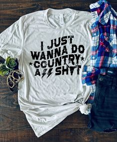 I Just Wanna Do Country Ass Shit Bella + Canvas Unisex Shirt by Boots and Roots Apparel. Embrace your inner country spirit with our "I Just Wanna Do Country Ass Shit" shirt from Boots and Roots Apparel! 🤠🌾 Made with the finest materials and crafted with care in Texas, this Bella + Canvas shirt is as comfortable as it is stylish. Whether you're hitting the backroads, wrangling cattle, or simply enjoying the rural life, this shirt is perfect for those who crave the simple joys of country living.