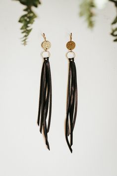 Add these handmade leather earrings to your boho accessories! Made from deer skin leather, these comfortable and lightweight yet stylish gems go beautifully with any outfit and season.  Offered in different lengths. Please note the measurements are including the hoop and clasp. To see what bracelets and other accessories you can pair with these earrings, please check out my shop: https://www.etsy.com/shop/thebohemyco Leather Strip Earrings, Black Leather Earrings, Elegant Leather Fringe Jewelry, Chic Adjustable Tassel Earrings, Bohemian Leather Dangle Earrings, Elegant Adjustable Tassel Earrings For Festivals, Chic Adjustable Fringe Jewelry, Adjustable Leather Tassel Earrings, Feather Earrings Diy