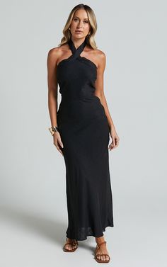 Maelynn Midi Dress - Linen Look Twist Halter Neck Low Back Slip Dress in Black Chic Fitted Maxi Dress With Cross Back, Chic Cross Back Maxi Dress For Night Out, Date Night Halter Neck Maxi Dress With Crisscross Straps, Elegant Summer Maxi Dress With Cross Back, Chic Halter Neck Maxi Dress With Crisscross Straps, Elegant Cross Back Maxi Dress For Night Out, Elegant Cross Back Halter Dress For Summer, Elegant Black Backless Dress With Crisscross Straps, Black Cross Back Dress With Tie