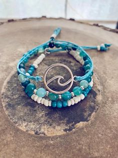 Adjustable Beachy Beaded Bracelets For Everyday, Everyday Adjustable Ocean-inspired Jewelry, Adjustable Ocean-inspired Jewelry For Everyday, Adjustable Ocean-inspired Everyday Jewelry, Bohemian Beach Season Friendship Bracelets, Bohemian Bracelets For Friendship And Beach Season, Turquoise Bohemian Jewelry For Beach Party, Turquoise Bohemian Wrap Bracelet For Beach, Beach Jewelry Blue Hand-wrapped