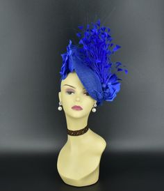 ✿*.Key Features.*✿ This is an elegant fascinator. Very beautiful! It is the most fun accessory you will ever wear to a wedding, an afternoon garden party or the horse races. Highly recommend! Fascinator base size: 10"*8.5" (25cm*22cm) If you want other colors in this style, just search the same item code in my store, you will find them. ✿*.Tip.*✿ ❣️If you want a customized piece, please follow the instructions below: 🔹Present style of hat or fascinator you would like from the store, with additional photos of your outfit and any other details you'd like me to know. 🔹After this process is done, I will send a photo of the selection of materials that are available to be used for the specified design hat or a finished designed hat by your request. The hat will be done until you are satisfied! Blue Feathered Headpiece For Party, Blue Feathered Wedding Fascinator, Blue Feather Trim Headpiece For Wedding, Blue Wedding Headpiece With Feather Trim, Blue Feather Trim Fascinator For Kentucky Derby, Blue Feathered Wedding Costume Hat, Elegant Blue Headpiece With Feather Trim, Blue Wedding Costume Hat With Feathers, Blue Feathered Headband Fascinator