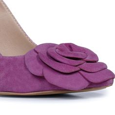 Redefine your fashion statement with our neat and elegant pairs to match your vibe this summer. These statement heels are crafted in purple suede Leather, a high platform heel to complement your classic evening looks, finished with a gold buckle fastening on the slingback, a leather covered block heel completes the style. Closure - Buckle Sling Back Upper - Purple Suede Leather Lining - Sahara genuine leather Insole - Nude Leather Sole - Natural Tunit Heel Height - 10.66 cm (4.2 Inches) Elegant Suede Platform Heels, Elegant Suede Wedge Heels, Party Suede Wedge Heels, Purple Suede High Heels, Purple Suede High Heel Heels, Purple Suede Heels For Evening, Purple Suede Evening Heels, Purple Suede Heels With Pointed Toe, Statement Heels